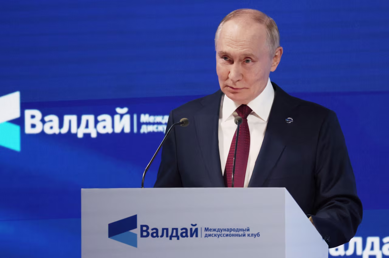 In this pool photograph distributed by the Russian state agency Sputnik, Russia's President Vladimir Putin gives a speech during the Valdai Discussion Club meeting in Sochi on October 2.