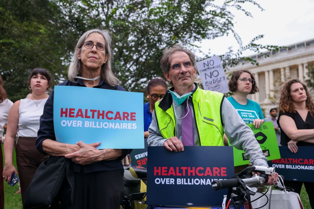 People attend a healthcare protest outside the US Capitol on September 30, the eve of the government shutdown.