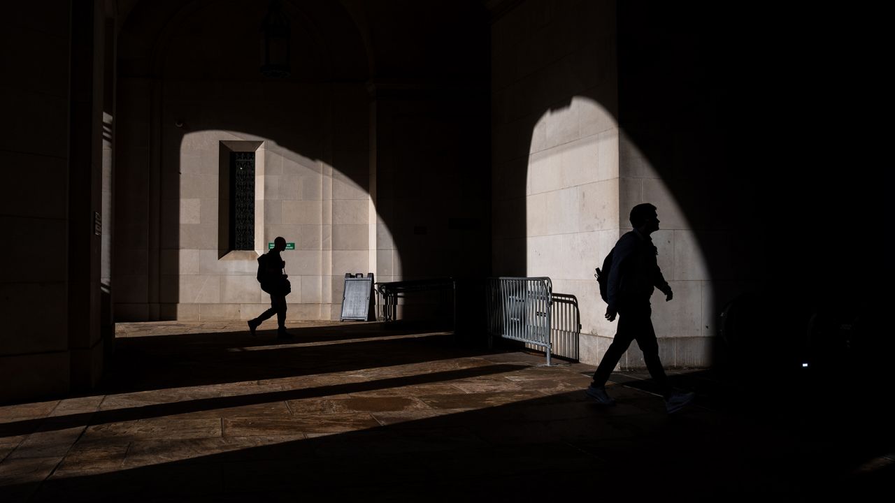 The Federal Triangle metro station in Washington, DC, on October 2. President Donald Trump is weighing slashing "thousands" of federal jobs ahead of a meeting with his budget director, Russell Vought, as the White House looks to ratchet up pressure on Democrats to end a government shutdown that has entered its second day.