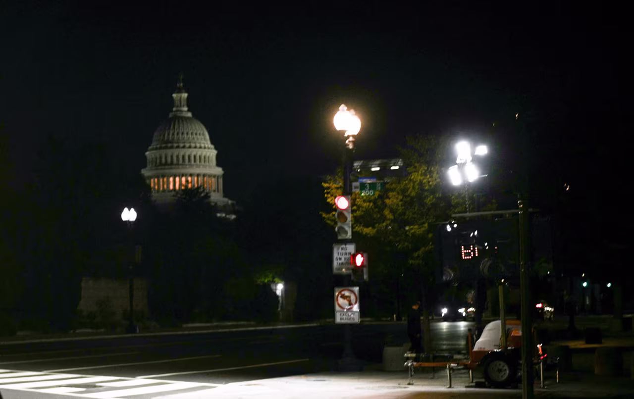 The US Capitol looms in the distance on the second day of the US government shutdown in Washington, DC, on Thursday.