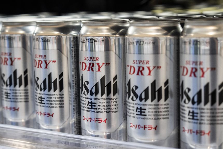 Asahi Super Dry beers are seen on display at a supermarket in Tokyo on October 3, 2025.