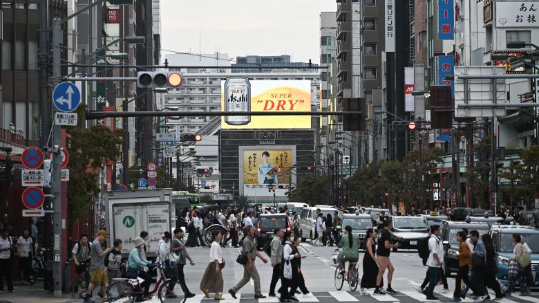 A billboard for Asahi Super Dry beer in Tokyo, on October 3, 2025.
