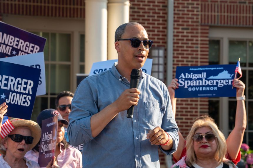 Jay Jones speaks to the audience during an Abigail Spanberger bus tour stop in Fairfax, VA, on June 26, 2025.