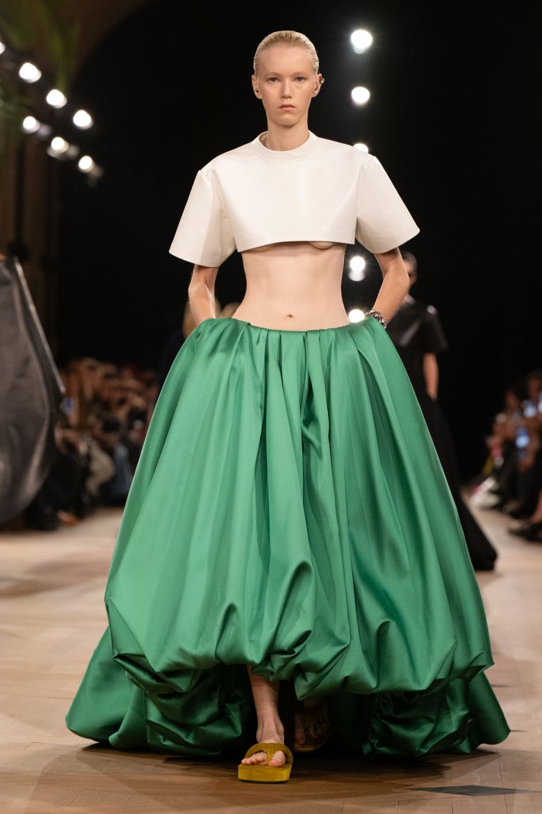 Crop tops, flat shoes and billowing skirts: Backstage, the designer walked about prioritizing comfort.