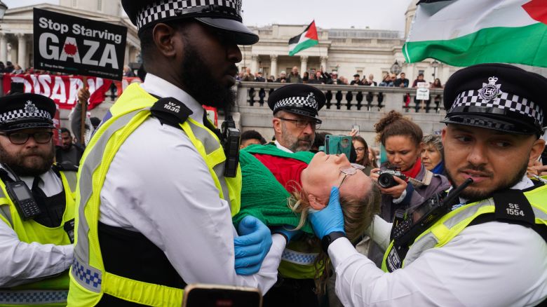 Nearly 500 people were arrested for displaying their support for the banned activist group Palestine Action in Trafalgar Square, central London, on Saturday.