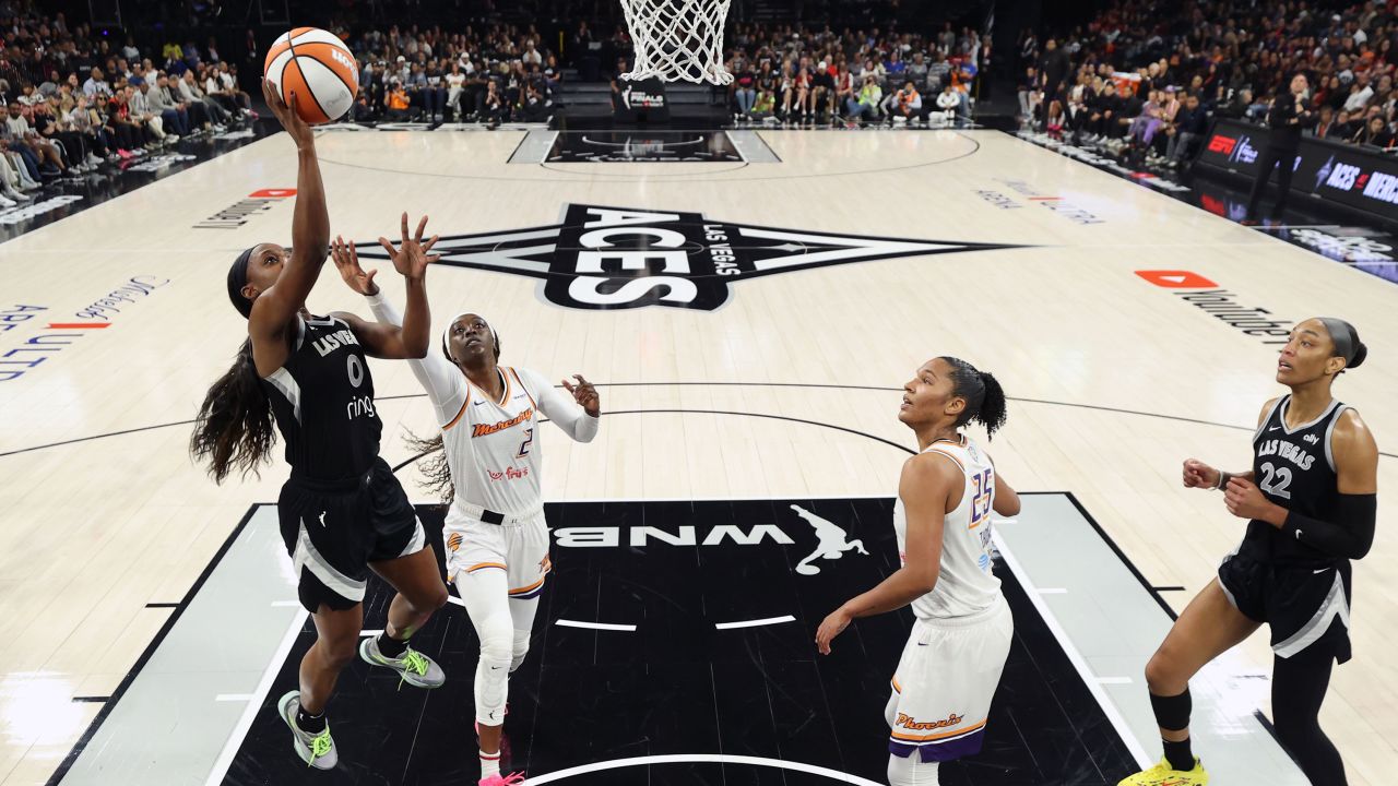 LAS VEGAS, NV - OCTOBER 5: Jackie Young #0 of the Las Vegas Aces drives to the basket during the game against the Phoenix Mercury during Game 2 of the 2025 WNBA Finals on October 5, 2025 at Michelob ULTRA Arena n Las Vegas, Nevada. NOTE TO USER: User expressly acknowledges and agrees that, by downloading and or using this photograph, User is consenting to the terms and conditions of the Getty Images License Agreement. Mandatory Copyright Notice: Copyright 2025 NBAE (Photo by Stephen Gosling/NBAE via Getty Images)