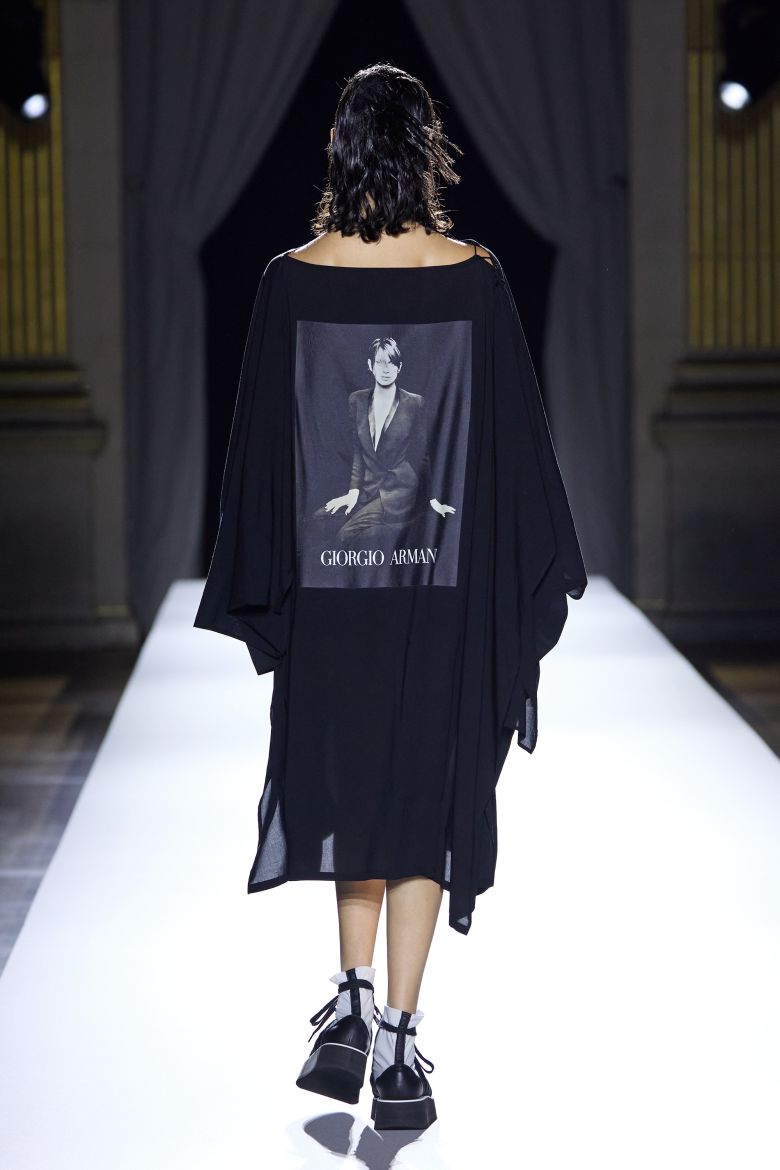 For Spring-Summer 2026, Yamamoto showed a heartfelt tribute to the late Giorgio Armani, whose past campaigns were printed on the back of dresses...