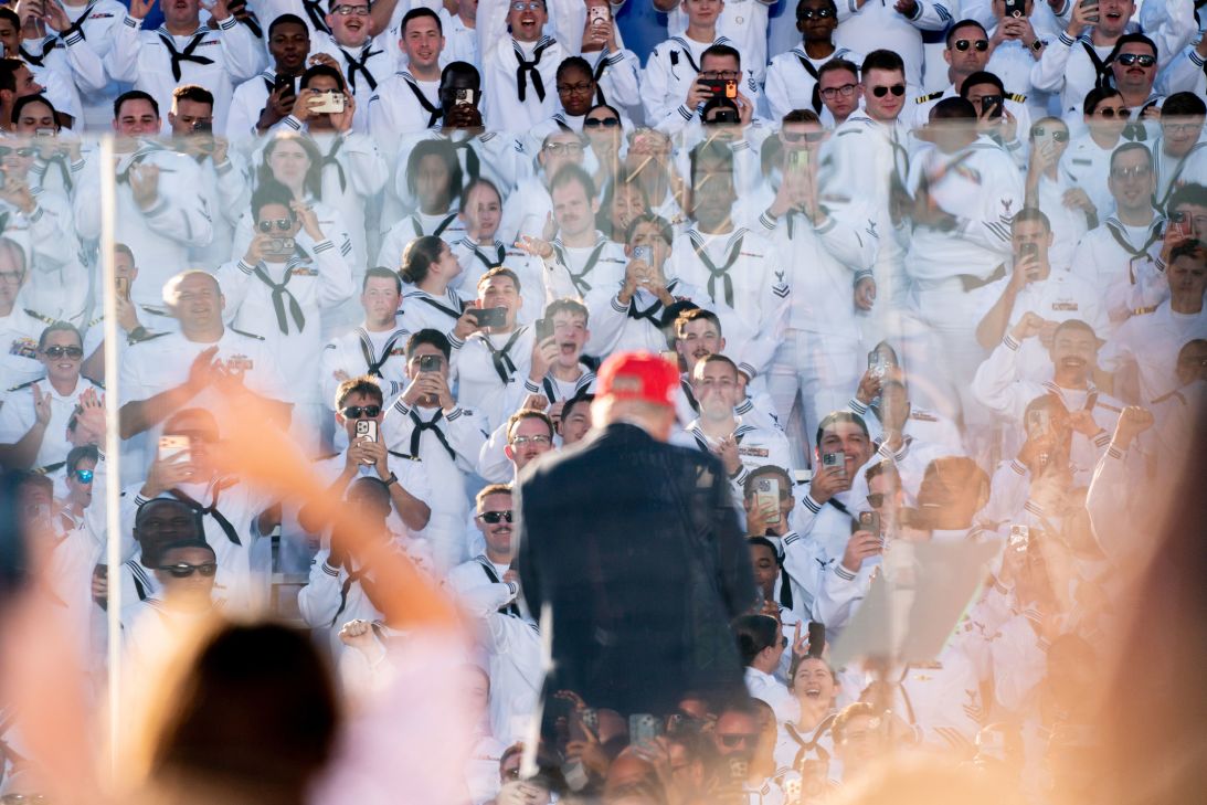 Members of the US Navy react as President Donald Trump acknowledges them during a celebration for the Navy's 250th anniversary in Norfolk, Virginia, on Sunday.