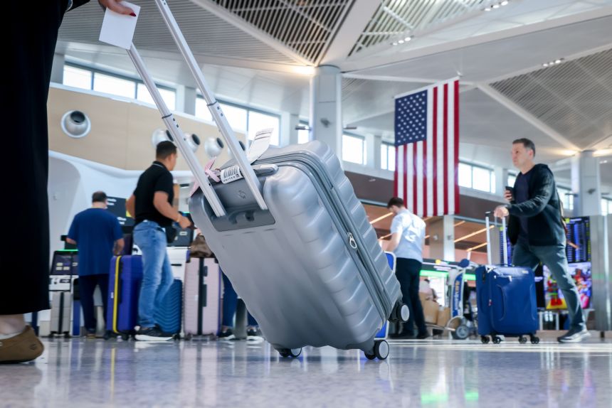 Travelers at Newark Liberty International Airport in Newark, New Jersey, on Monday.