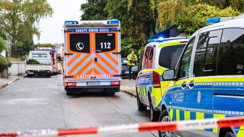 An ambulance and police cars are seen near the site where Iris Stalzer, the newly elected mayor of Herdecke, western Germany, was severely injured in a knife attack, in Herdecke, Germany on Tuesday, October 7.