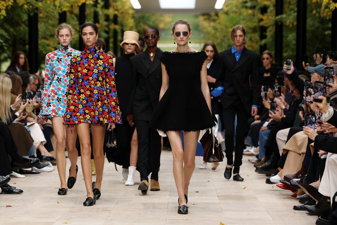 Some dresses from the Celine show had vibrant floral prints; others came entirely in black but had a playful open back. They were paired with flat shoes.