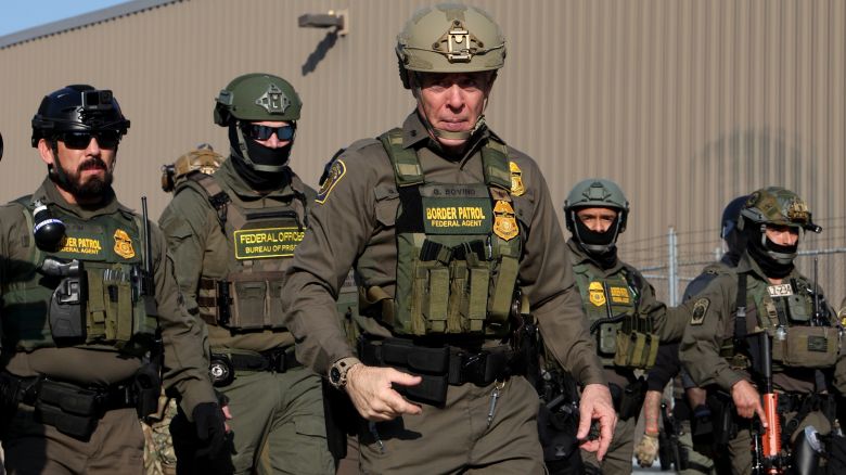 Gregory Bovino, the chief US Border Patrol agent, center, leads several federal agents toward protesters as dozens of protesters clash with federal agents and Illinois State police near the US Immigration and Customs Enforcement holding facility in Broadview, Illinois, on October 3.