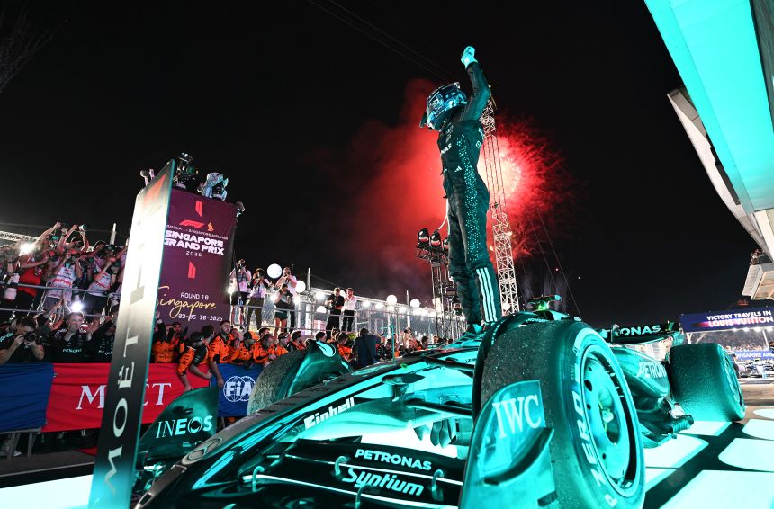 Race winner George Russell of Great Britain and Mercedes AMG Petronas F1 Team celebrates during the F1 Grand Prix of Singapore at Marina Bay Street Circuit today.