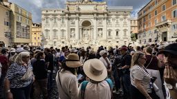 ROME, ITALY - SEPTEMBER 30: Tourists visit the famous Trevi Fountain (Fontana di Trevi) in Rome, Italy on September 30, 2025. Designed by Italian artist Nicola Salvi and completed in 1762, the historic fountain is considered one of the most important works of Baroque architecture. Attracting millions of tourists every year, the Trevi Fountain draws attention with its artistic details and sculptural compositions. (Photo by Seyit Konyali/Anadolu via Getty Images)