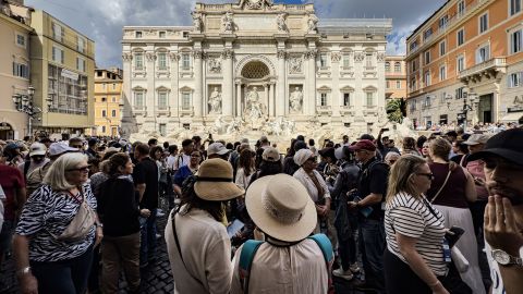 ROME, ITALY - SEPTEMBER 30: Tourists visit the famous Trevi Fountain (Fontana di Trevi) in Rome, Italy on September 30, 2025. Designed by Italian artist Nicola Salvi and completed in 1762, the historic fountain is considered one of the most important works of Baroque architecture. Attracting millions of tourists every year, the Trevi Fountain draws attention with its artistic details and sculptural compositions. (Photo by Seyit Konyali/Anadolu via Getty Images)