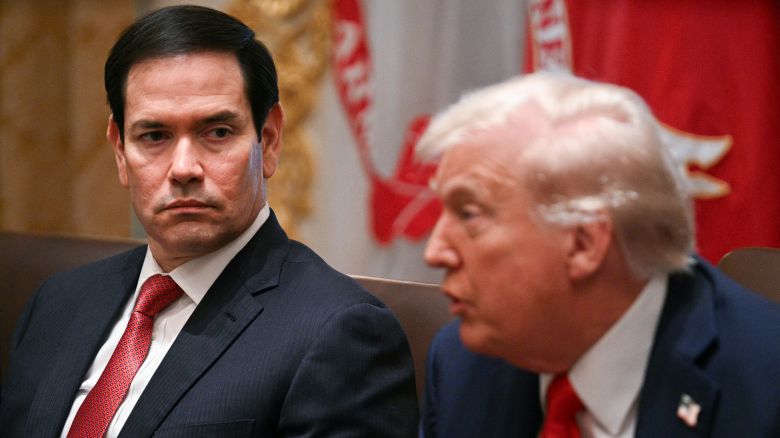Secretary of State Marco Rubio looks on as US President Donald Trump speaks during a cabinet meeting in the Cabinet Room of the White House in Washington, DC, on October 9, 2025.