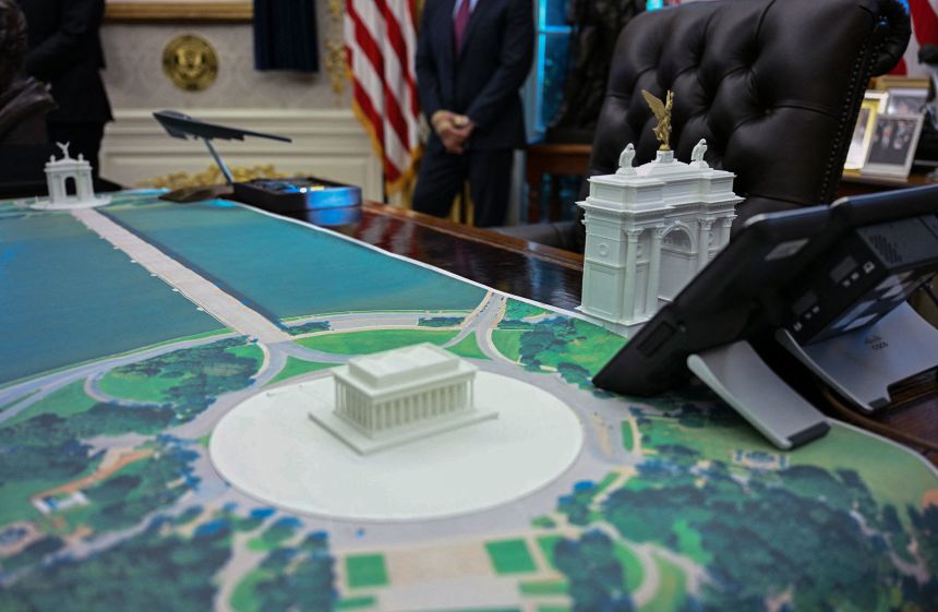 A plan for an arch across from the Lincoln Memorial is seen on the Resolute Desk as US President Donald Trump meets with Finnish President Alexander Stubb and Prime Minister Petteri Orpo in the Oval Office of the White House in Washington, DC, on October 9, 2025.