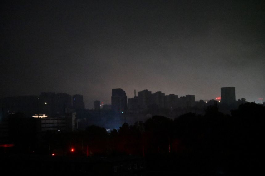 This photograph shows a view of Kyiv during a blackout following Russian drone and missile strikes on the Ukrainian capital on October 10, 2025.