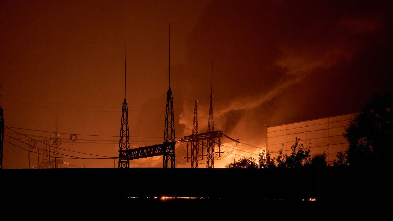 Firefighters battle flames at a thermal power plant following a series of explosions in Kyiv, Ukraine, on October 10, 2025.