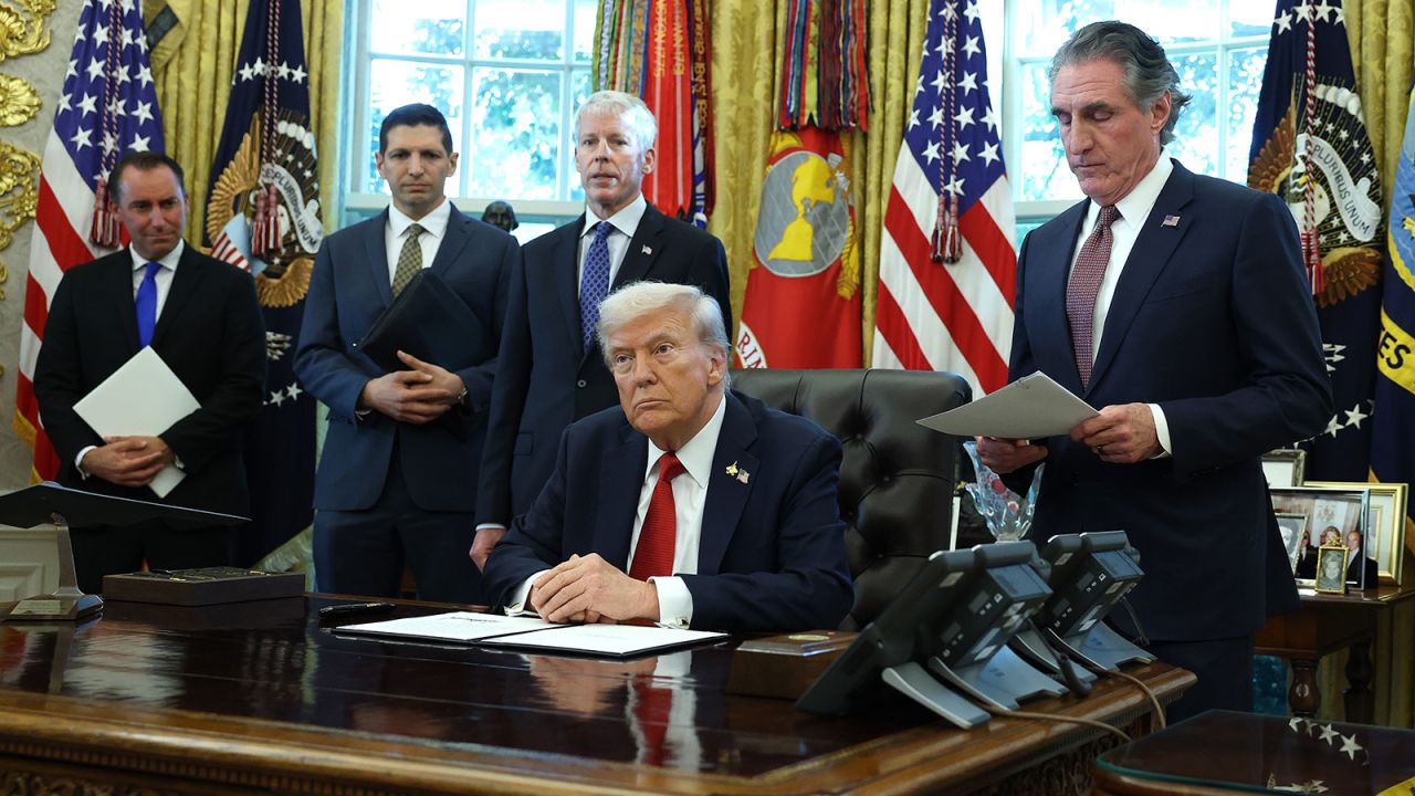 President Donald Trump, joined by Interior Secretary Doug Burgum, Energy Secretary Chris Wright and other administration officials, speaks in the Oval Office on October 6, 2025.