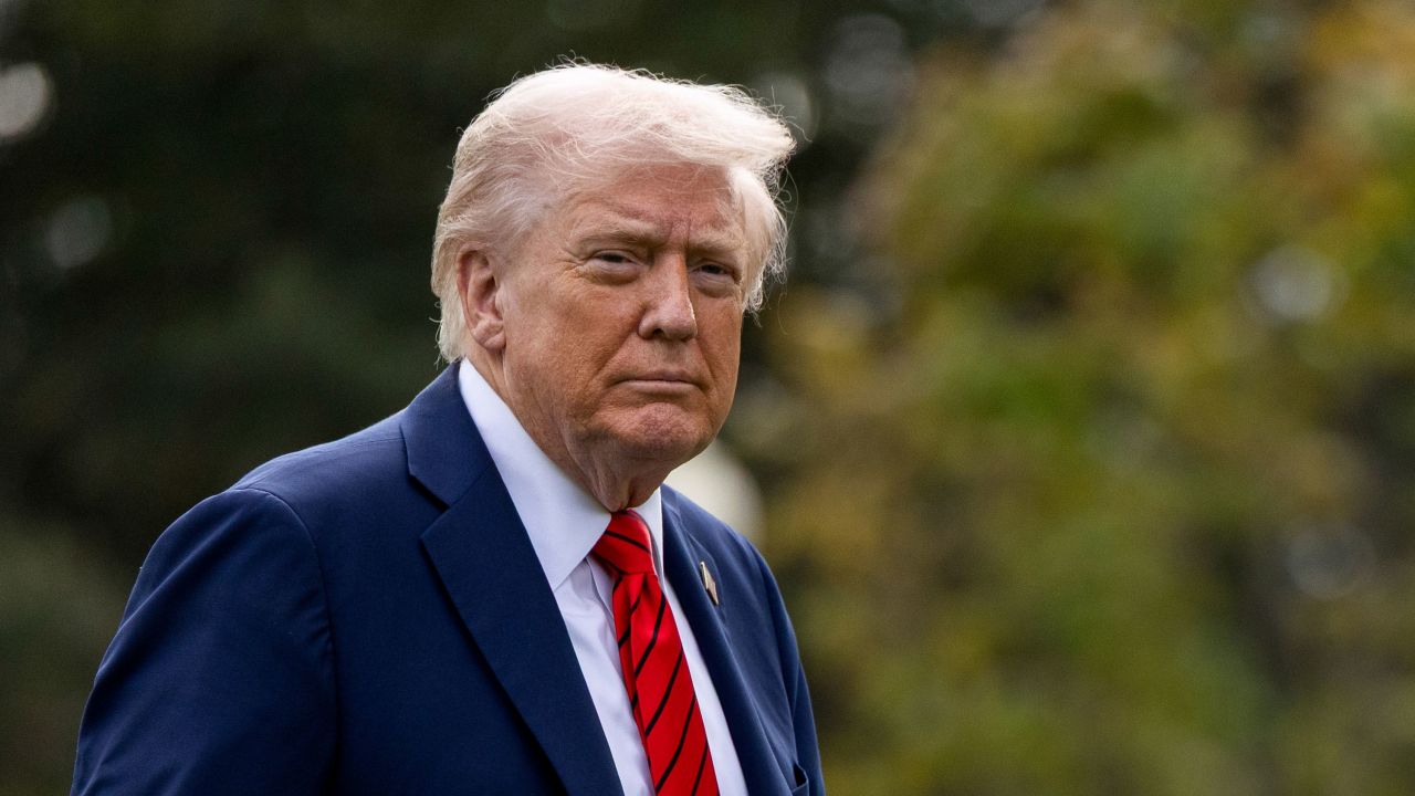 President Donald Trump walks on the South Lawn of the White House after arriving on Marine One in Washington, DC, on Friday.