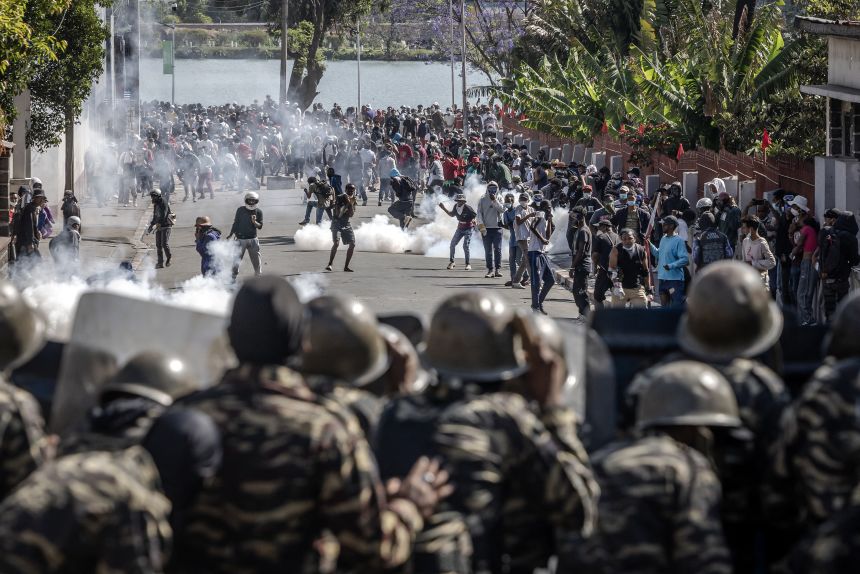Protesters clash with members of the Malagasy gendarmerie in Antananarivo on Saturday.