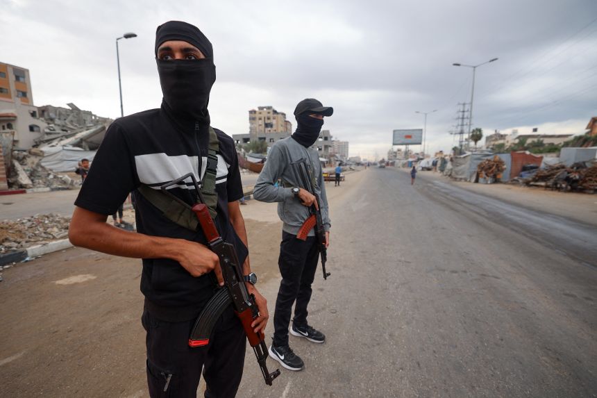 Members of the internal security forces loyal to Hamas in the Nuseirat refugee camp in the central Gaza Strip. Israel has been pulling back its forces as part of a ceasefire agreement