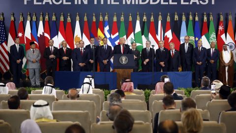 US President Donald Trump (C) delivers a statement during a summit on Gaza in Sharm el-Sheikh on October 13, 2025.
