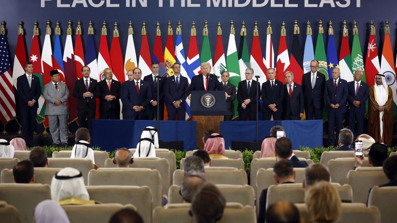 US President Donald Trump (C) delivers a statement during a summit on Gaza in Sharm el-Sheikh on October 13, 2025.
