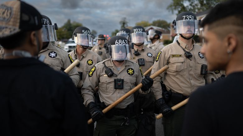 Police and demonstrators square off during.a protest outside of the immigration processing and detention facility on October 11, 2025 in Broadview, Illinois.