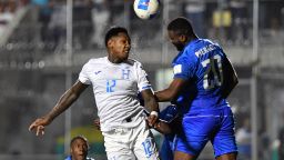 Honduras' forward #12 Romell Quioto and Haiti's forward #20 Frantzdy Pierrot jump to head the ball during the 2026 FIFA World Cup Concacaf qualifier football match between Honduras and Haiti at the Chelato Ucles National Stadium in Tegucigalpa on October 13, 2025. (Photo by Orlando SIERRA / AFP) (Photo by ORLANDO SIERRA/AFP via Getty Images)