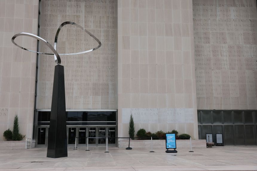 Closed signage is seen at the National Museum of American History on the National Mall in Washington, DC on Sunday.