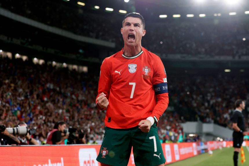 Cristiano Ronaldo celebrates after scoring his first goal against Hungary on October 14.