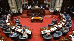 Senators debate a euthanasia bill at the Legislative Palace in Montevideo on October 15, 2025. The Uruguayan Senate began voting to pass a controversial euthanasia bill into law. If approved, Uruguay will join a small group of countries that allow the procedure, including Canada, the Netherlands, New Zealand and Spain. (Photo by Santiago Mazzarovich / AFP) (Photo by SANTIAGO MAZZAROVICH/AFP via Getty Images)          