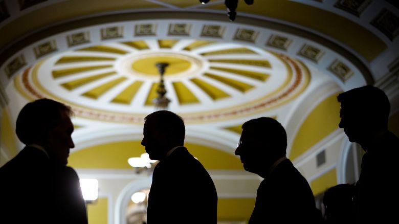 Sen. James Lankford (R-OK), Senate Majority Leader John Thune (R-SD), Senate Majority Whip John Barrasso (R-WY), and Sen. Tom Cotton (R-AR) step away from reporters following a Republican policy luncheon at the US Capitol Building on October 15, in Washington, DC.