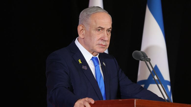 Israeli Prime Minister Benjamin Netanyahu participates in a state memorial ceremony for the fallen soldiers of the two-year Gaza war at the Mount Herzl military cemetery in Jerusalem on October 16, 2025. Netanyahu said on October 16, that he was determined to ensure that Hamas hands back the remains of hostages still in Gaza, adding that the fight "is not over yet". (Photo by Alex KOLOMOISKY / POOL / AFP) (Photo by ALEX KOLOMOISKY/POOL/AFP via Getty Images)