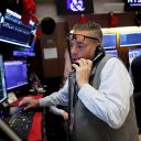 NEW YORK, NEW YORK - OCTOBER 14: Traders work on the floor of the New York Stock Exchange during afternoon trading on October 14, 2025 in New York City. The Dow Jones closed over 200 points higher after dipping earlier in the day under 300 points.  (Photo by Michael M. Santiago/Getty Images)