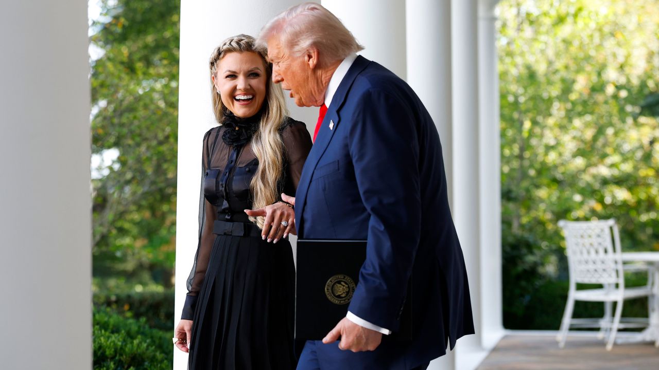 WASHINGTON, DC - OCTOBER 14: Erika Kirk (L), wife of late conservative activist Charlie Kirk, arrives with U.S. President Donald Trump as he posthumously awards the Presidential Medal of Freedom to Charlie Kirk during a ceremony in the Rose Garden of the White House on October 14, 2025 in Washington, DC. Today marks the National Day of Remembrance for Charlie Kirk who was shot and killed on September 10th at Utah Valley University. (Photo by Kevin Dietsch/Getty Images)