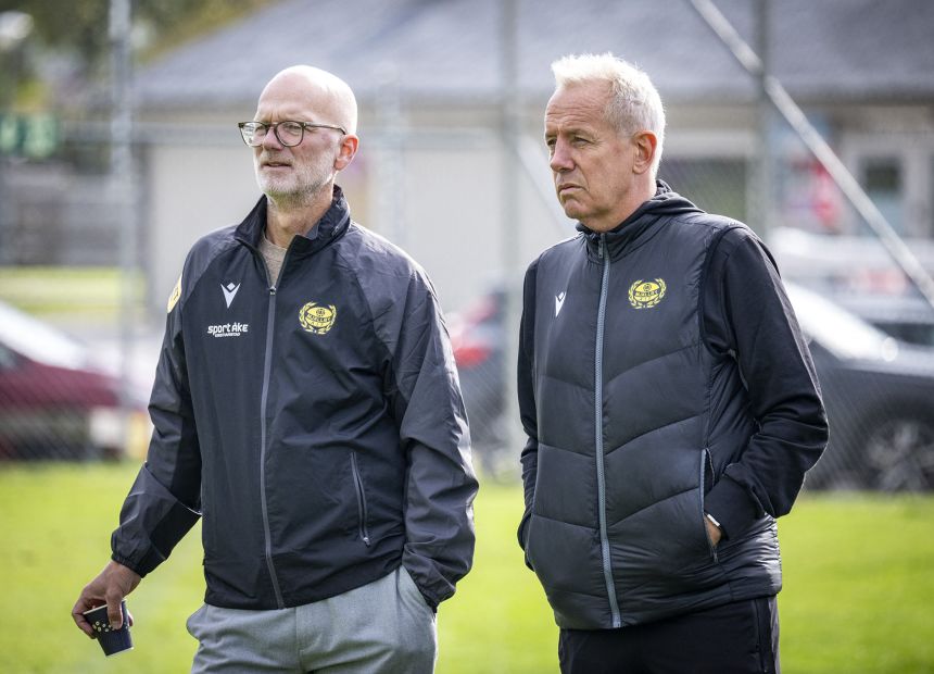 Mjällby chairman Magnus Emeus (L) and sports director Hasse Larsson attend a training session on October 1.