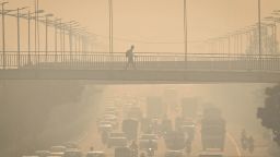A layer of smog can be seen in the early hours of the morning at Wazirabad, in New Delhi, India, on October 18, 2025.
