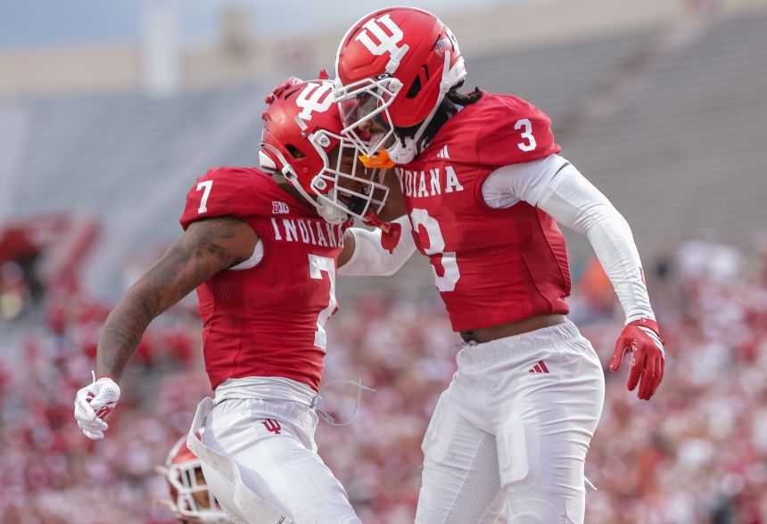 Indiana's EJ Williams Jr., left, and Omar Cooper Jr. celebrate during the second half of the Hoosiers' win against Michigan State on Saturday.