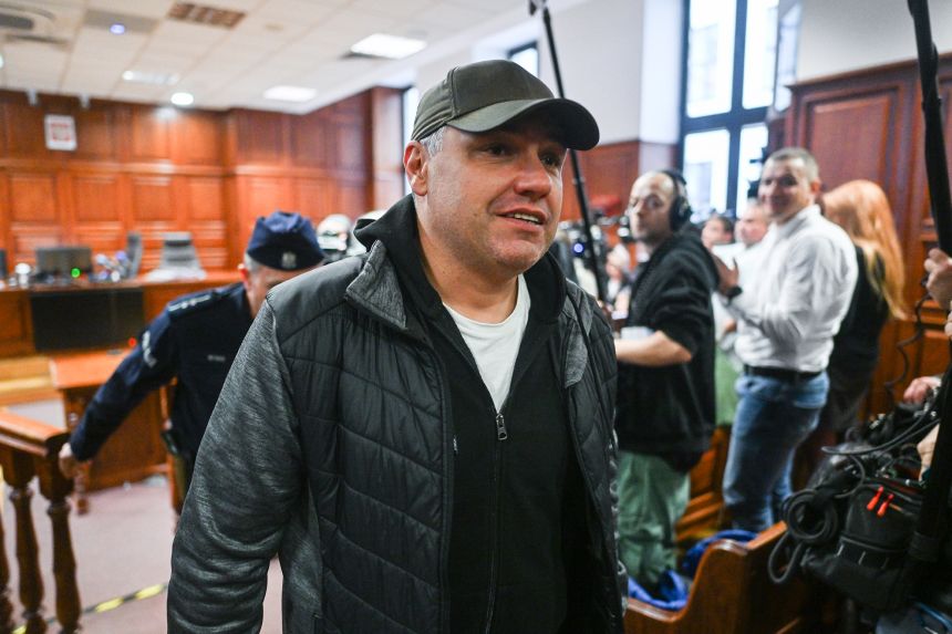 Volodymyr Zhuravlev, a Ukrainian diver, is released from court after a judge rejected Germany's extradition request and released him from pretrial detention at a district court in Warsaw, Poland, on October 17, 2025.