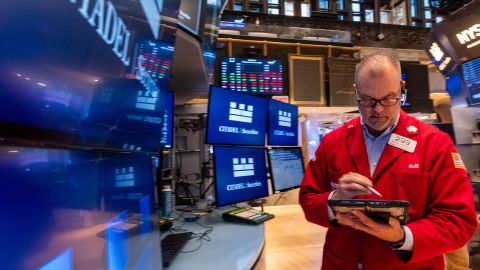 Traders work on the floor of the New York Stock Exchange on October 17.