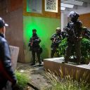 PORTLAND, OREGON - OCTOBER 18: Anti-I.C.E. protesters clash with federal agents at the U.S. Immigration and Customs Enforcement building on October 18, 2025 in Portland, Oregon. Organizers expect millions to participate in cities and towns across the nation for the second "No Kings" protest to denounce the Trump administration.  (Photo by Mathieu Lewis-Rolland/Getty Images)
