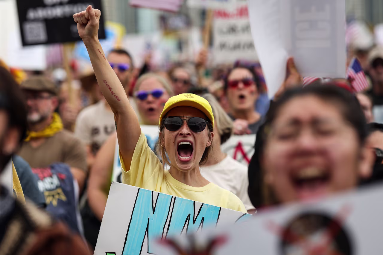 Protesters march in a "No Kings" protest in Chicago on Saturday.