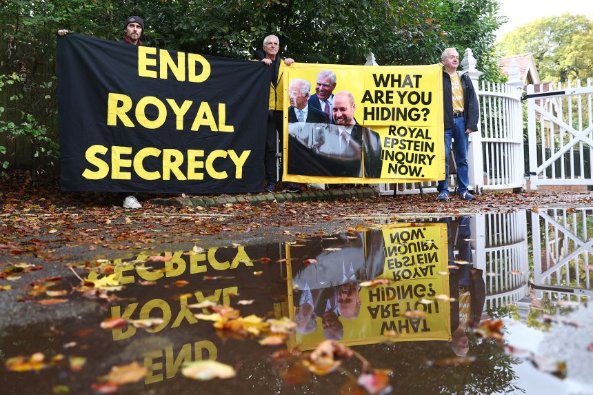 Activists from the anti-monarchy group Republic stage a protest at the entrance to Windsor Great Park and Royal Lodge where Prince Andrew lives on Tuesday.