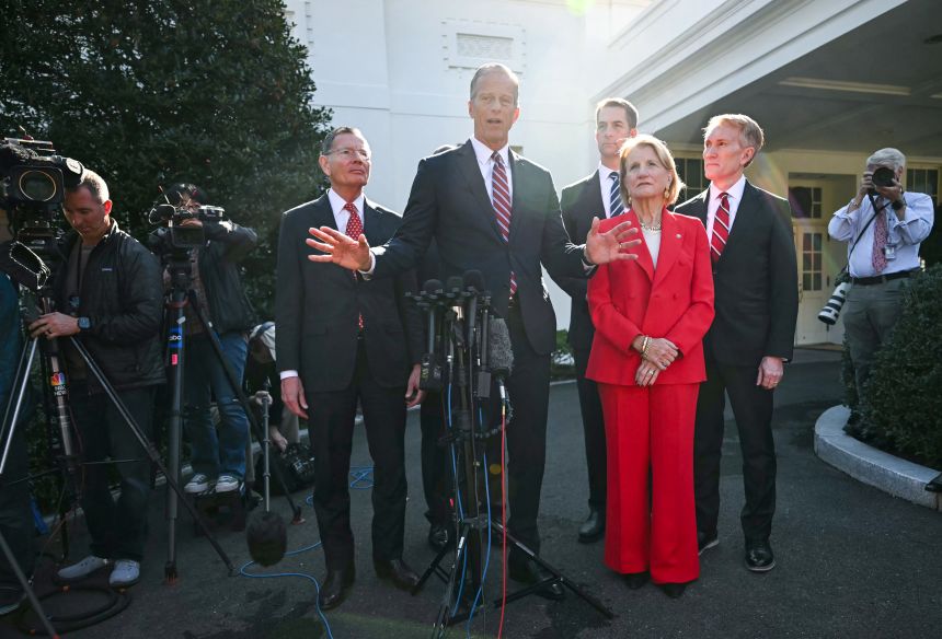 Senate Majority Leader John Thune speaks to the media outside the West Wing of the White House following a Rose Garden lunch with US President Trump and Senate Republicans in Washington, DC on Tuesday. Also pictured alongside Thune, from left tor right, Senate Majority Whip John Barrasso, Senator Tom Cotton, Senator Shelley Moore Capito, and Senator James Lankford.