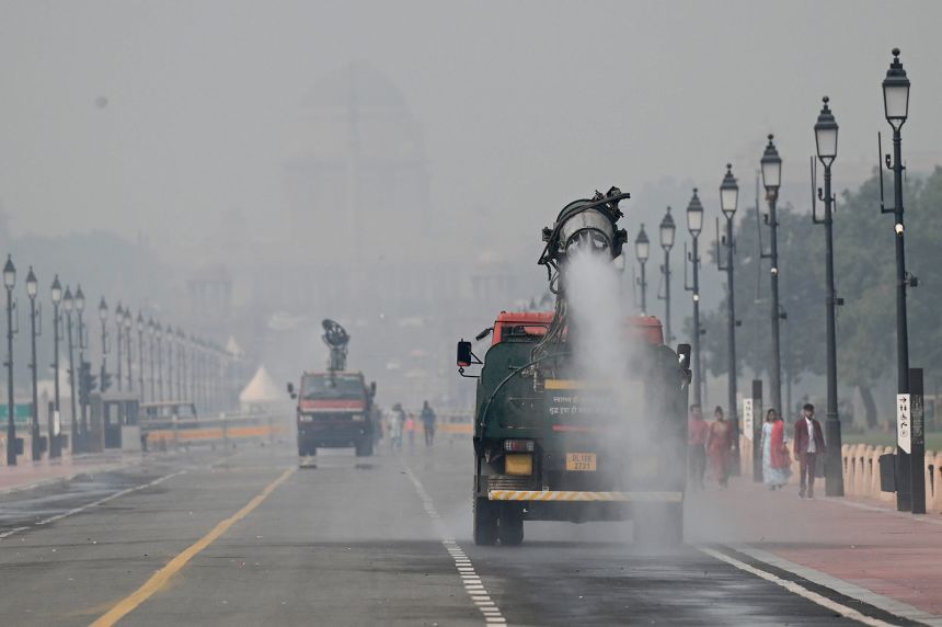 An anti-smog gun spraying water to settle down dust particles one day after Diwali in New Delhi, India, on October 20, 2025.