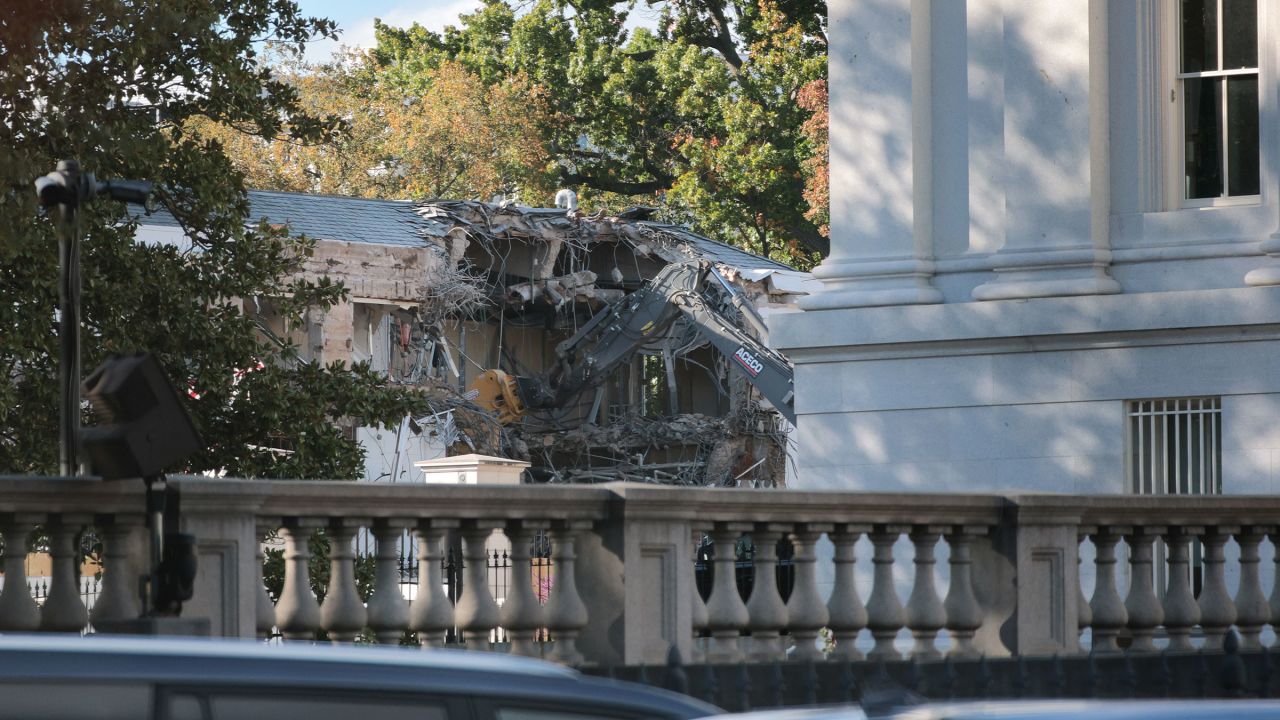 Workers demolish the facade of the East Wing of the White House on October 20, 2025. The demolition is part of President Donald Trump's plan to build a ballroom on the eastern side of the White House.
