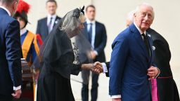 Britain's King Charles III and Britain's Queen Camilla arrive at San Damaso courtyard upon a meeting with Pope Leo XIV in the Vatican on October 23, 2025. (Photo by Alberto PIZZOLI / AFP) (Photo by ALBERTO PIZZOLI/AFP via Getty Images)          